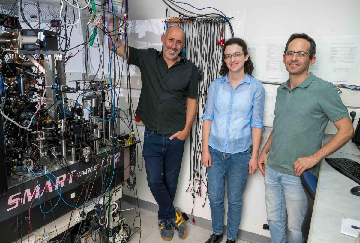 (g.d.) Prof. Ozeri, Pinkas and Dr. Nitzan Akerman. Ion and atom warm to one another
